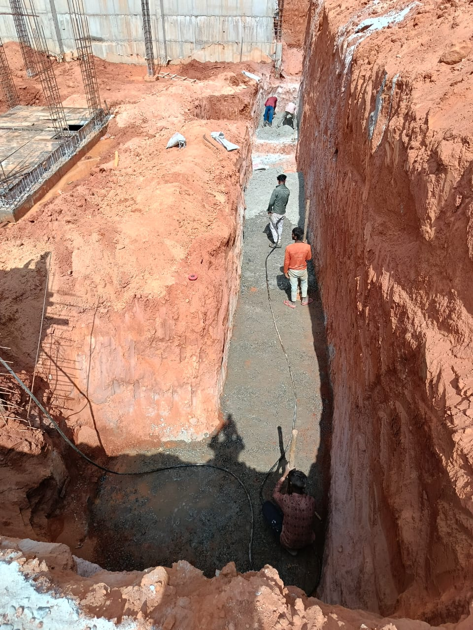 Foundation excavation and construction work in progress